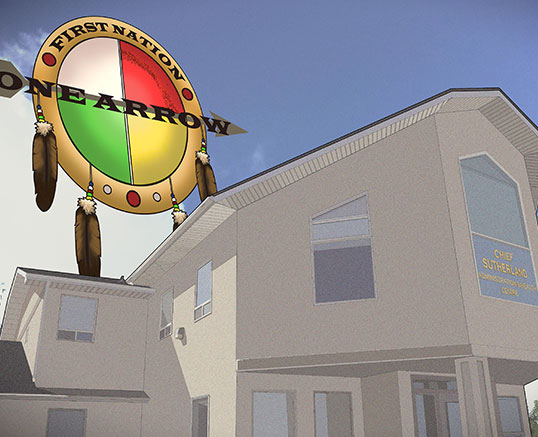 The One Arrow First Nation band office, with the Nation&rsquo;s medallion sign standing at the entrance.